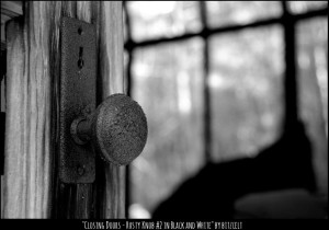 Closing Doors - Rusty Knob #2 in Black and White by Bitzcelt